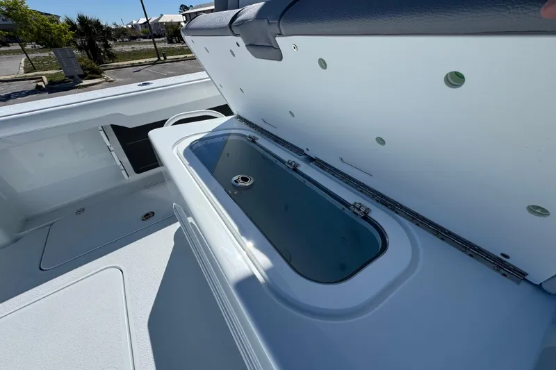 Slide: The Image of 2026 Yellowfin 36 Offshore boat with open storage compartment on deck. - 14