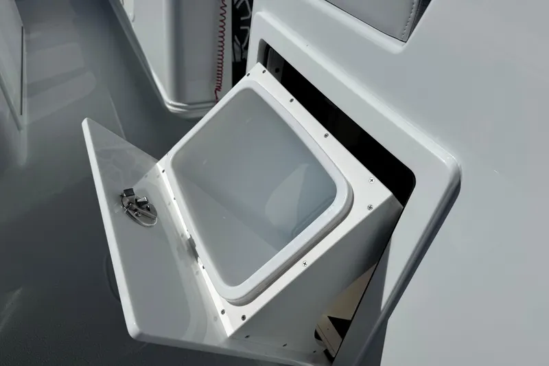 Slide: The Image of Open storage compartment on 2026 Yellowfin 36 Offshore boat. - 16