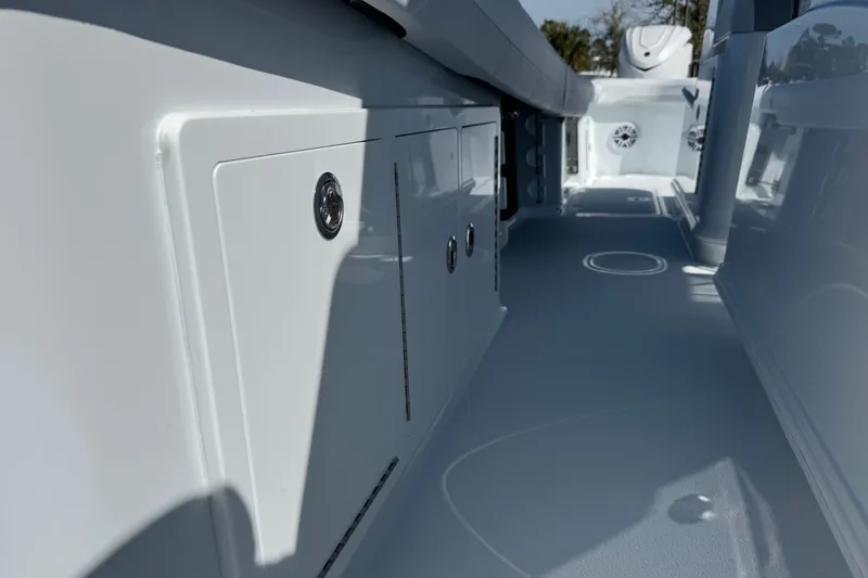 Slide: The Image of 2026 Yellowfin 36 Offshore boat interior, showcasing sleek storage compartments and modern design. - 29