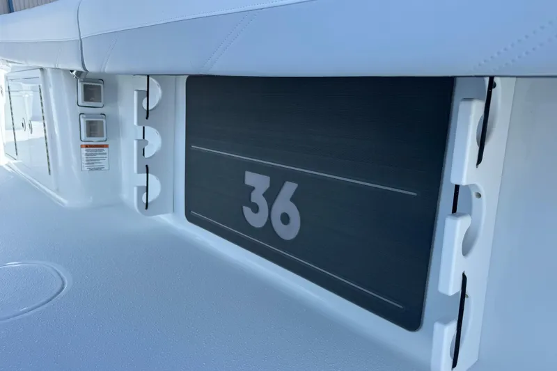 Slide: The Image of 2026 Yellowfin 36 Offshore boat interior detail with seating and storage compartments. - 33