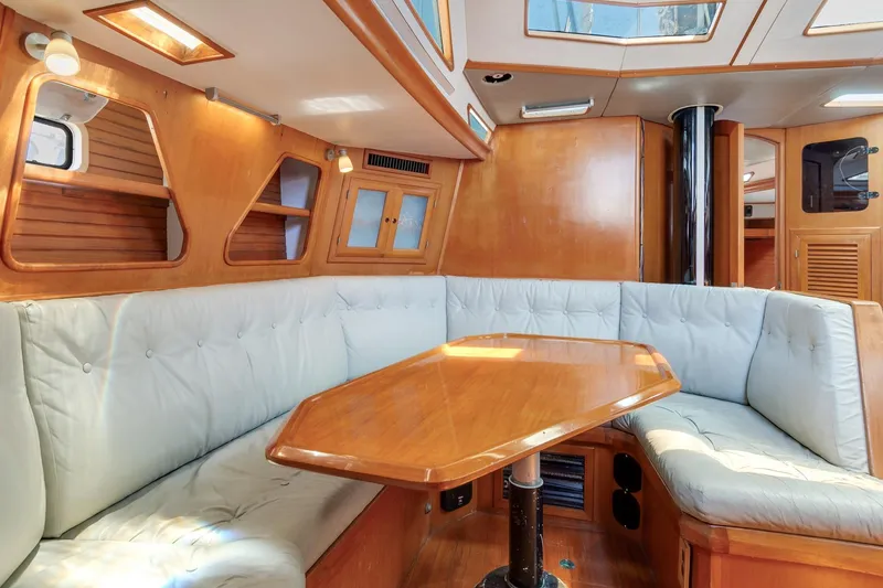 Slide: The Image of Luxurious 1987 Macintosh Center Cockpit interior with plush seating and wooden accents. - 4