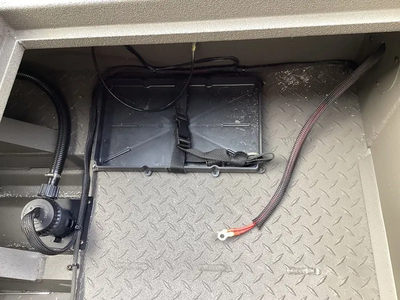 Slide: The Image of Interior of a 2026 Reaper 656 with cables and mounting bracket. - 12