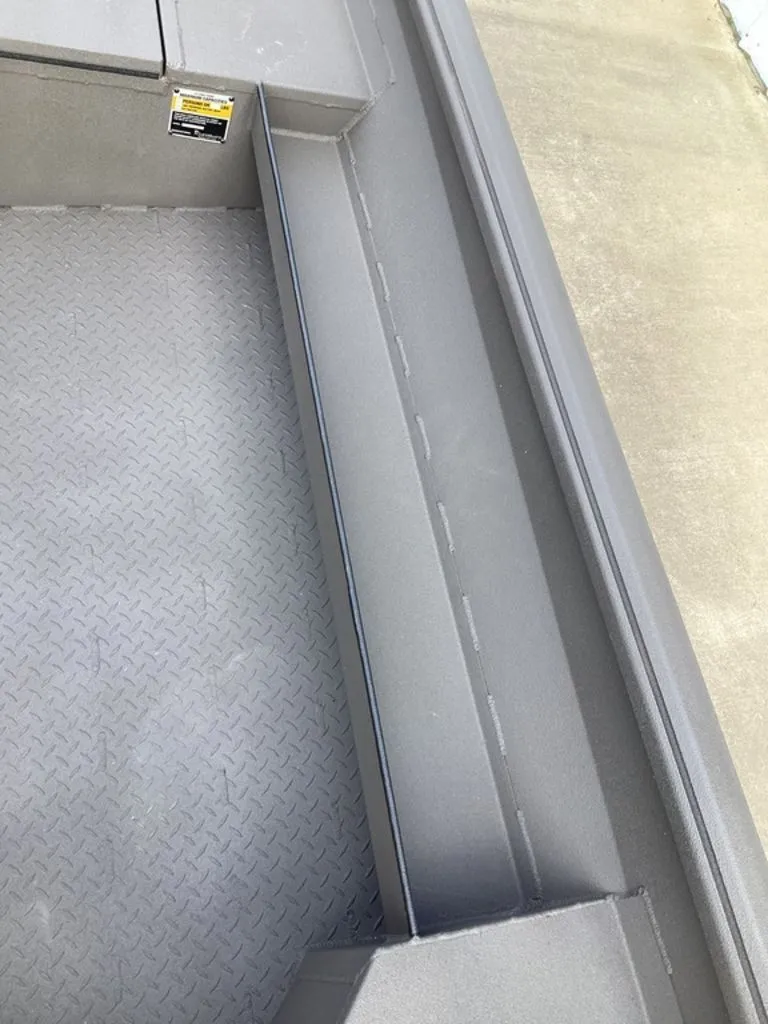 Slide: The Image of Interior of a 2026 Reaper 656 boat with non-slip flooring. - 17