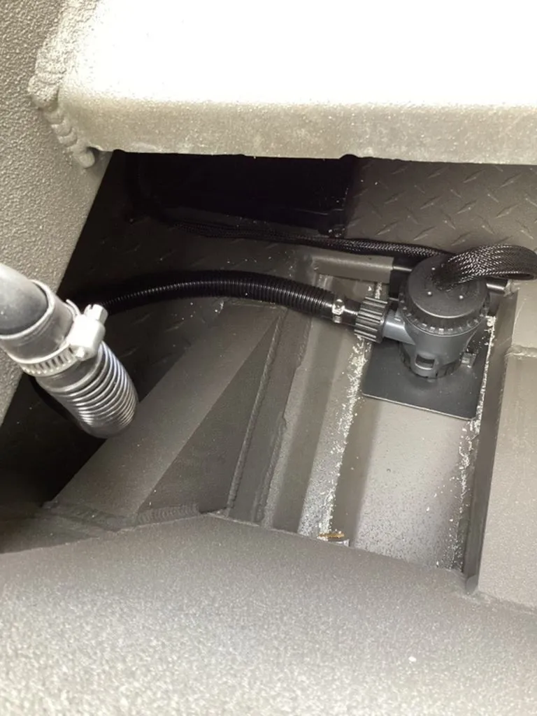 Slide: The Image of Interior view of a 2026 Reaper 656 with hoses and valves. - 3