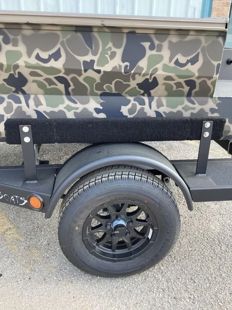 Slide: The Image of Reaper 656 trailer with camouflage pattern, year 2026. - 5