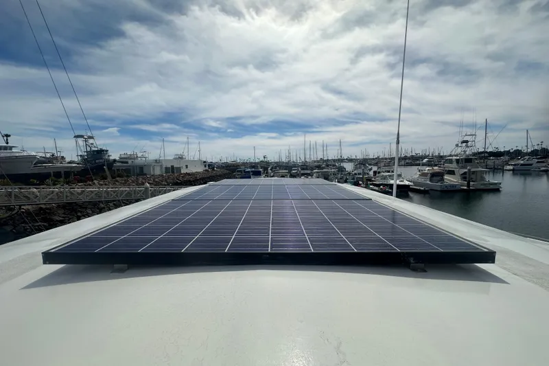 Slide: The Image of Solar panels on 1991 Californian 52 Cockpit Motor Yacht in marina setting. - 21