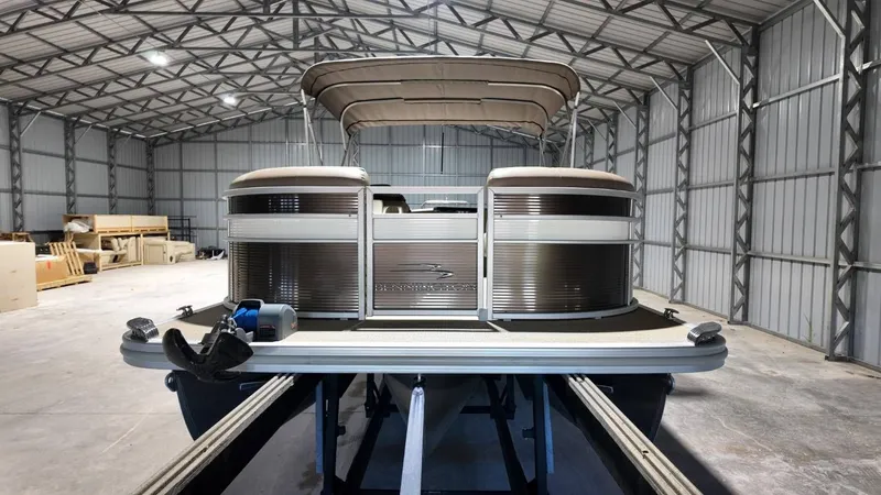 Slide: The Image of 2019 Bennington SXP SERIES 23SS pontoon boat in storage facility. - 22
