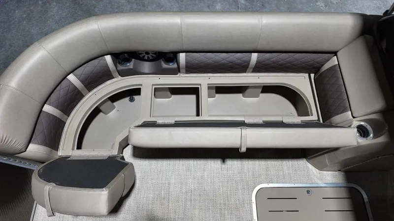 Slide: The Image of Interior of 2019 Bennington SXP SERIES 23SS with storage compartment. - 27