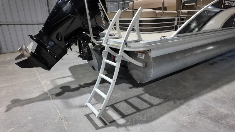 Slide: The Image of 2019 Bennington SXP SERIES 23SS pontoon boat with outboard motor and ladder. - 9