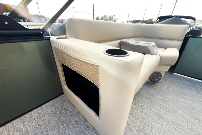 Slide: The Image of 2026 Godfrey Sweetwater Xperience 22' pontoon interior with split bench seating and cup holders. - 21
