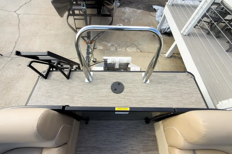 Slide: The Image of 2026 Godfrey Sweetwater Xperience 22' Split Bench Pontoon, rear view with seating and ladder. - 24