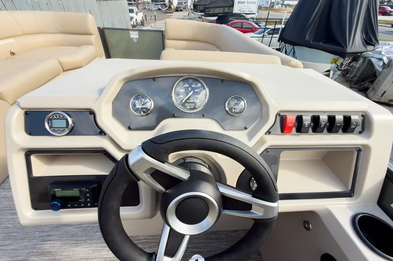 Slide: The Image of Steering console of 2026 Godfrey Sweetwater Xperience 22' Split Bench Pontoon. - 16