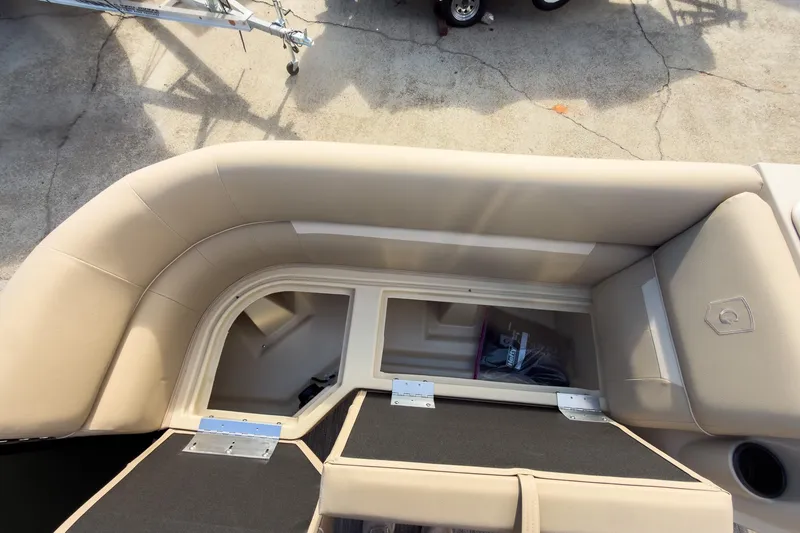 Slide: The Image of 2026 Godfrey Sweetwater Xperience 22' pontoon interior with storage compartment open. - 32