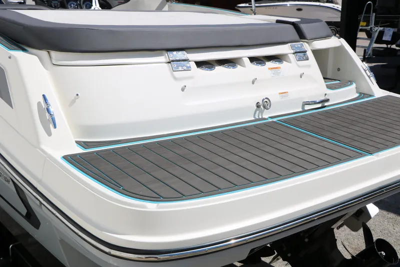 Slide: The Image of Rear view of a 2022 Bayliner VR5 boat with gray deck. - 12