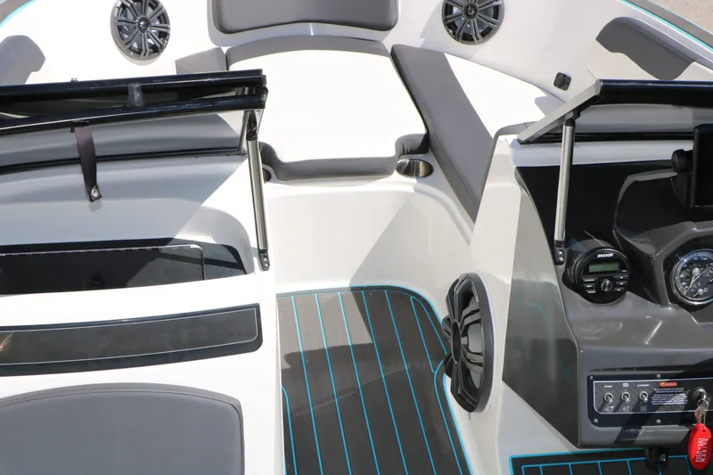 Slide: The Image of Interior of 2022 Bayliner VR5 with modern dashboard and speakers. - 18