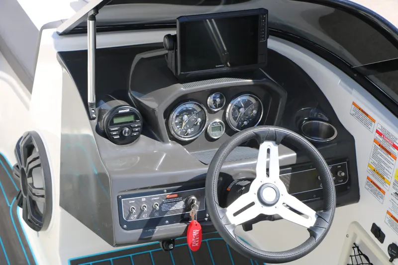 Slide: The Image of Bayliner VR5 2022 dashboard with steering wheel and instruments. - 19