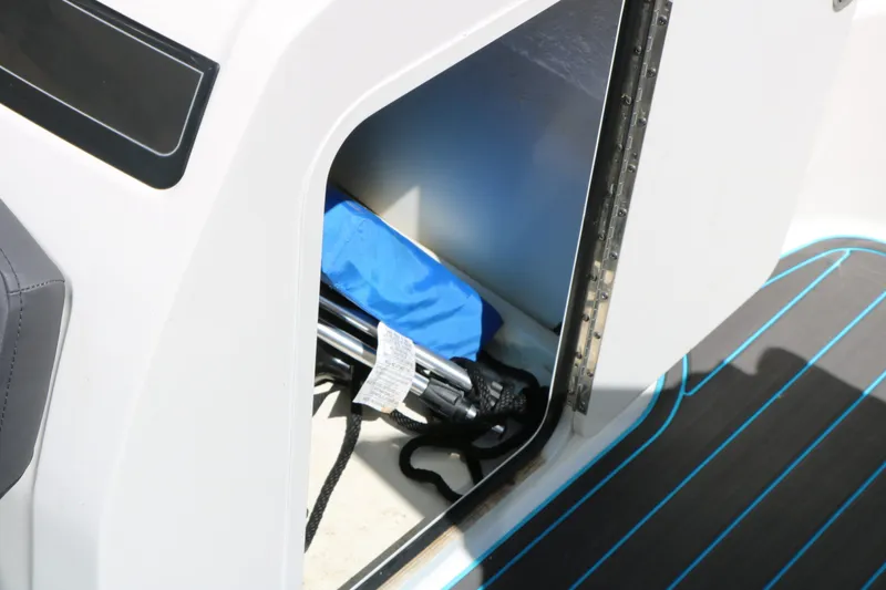 Slide: The Image of Storage compartment in 2022 Bayliner VR5 boat. - 38