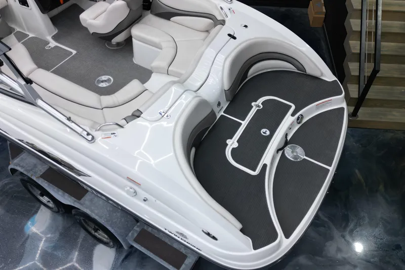 Slide: The Image of 2008 Yamaha Boats 212X interior with sleek seating and modern design. - 10