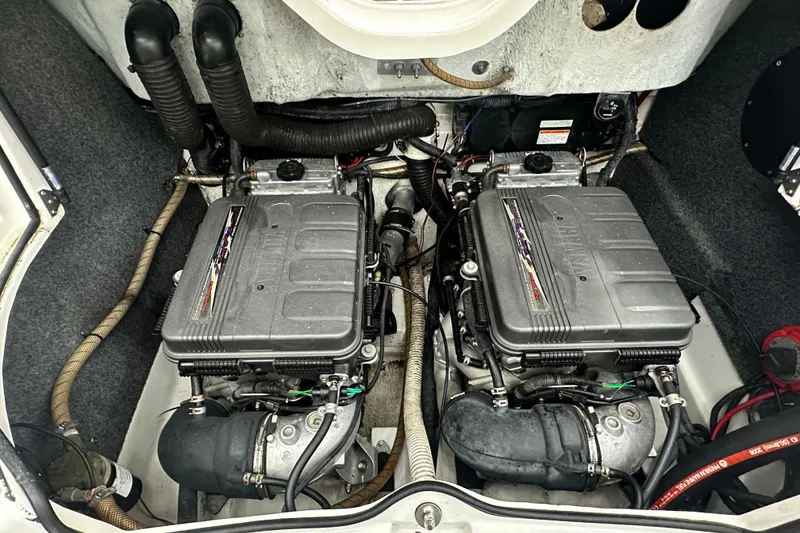 Slide: The Image of Engine compartment of a 2008 Yamaha Boats 212X, featuring dual engines and detailed components. - 17