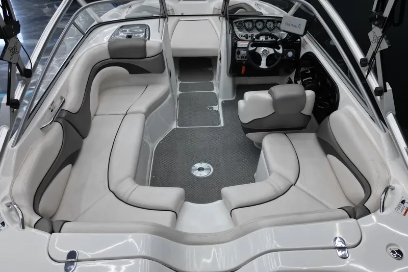 Slide: The Image of 2008 Yamaha Boats 212X interior with plush seating and modern dashboard. - 5