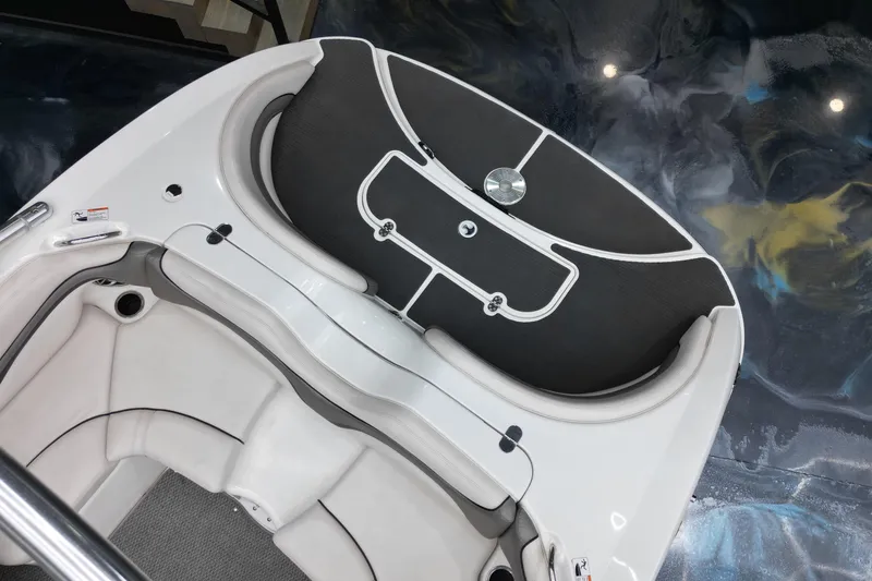 Slide: The Image of Interior view of a 2008 Yamaha Boats 212X, showcasing sleek seating and modern design. - 8