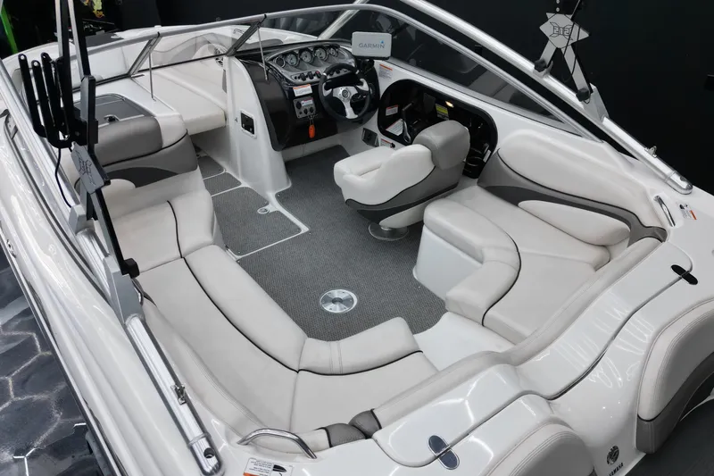 Slide: The Image of 2008 Yamaha Boats 212X interior with sleek seating and modern dashboard design. - 9