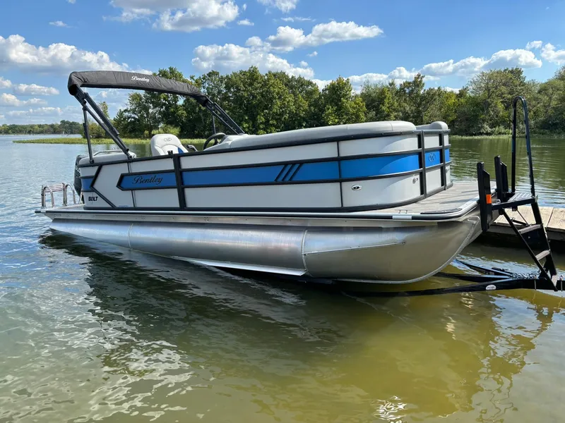 Slide: The Image of 2026 Bentley Pontoons 223 Bolt on a serene lake. - 36