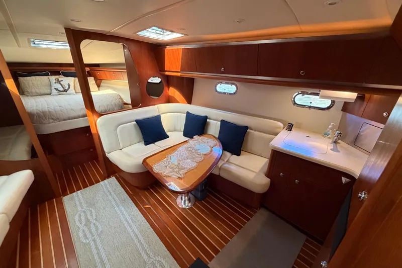Slide: The Image of Luxurious interior of 2005 Tiara Yachts 3600 Sovran with cozy seating and elegant wood finishes. - 21