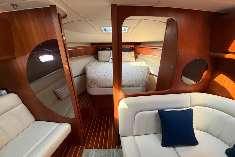 Slide: The Image of Luxurious 2005 Tiara Yachts 3600 Sovran interior with cozy cabin and elegant wood finishes. - 24