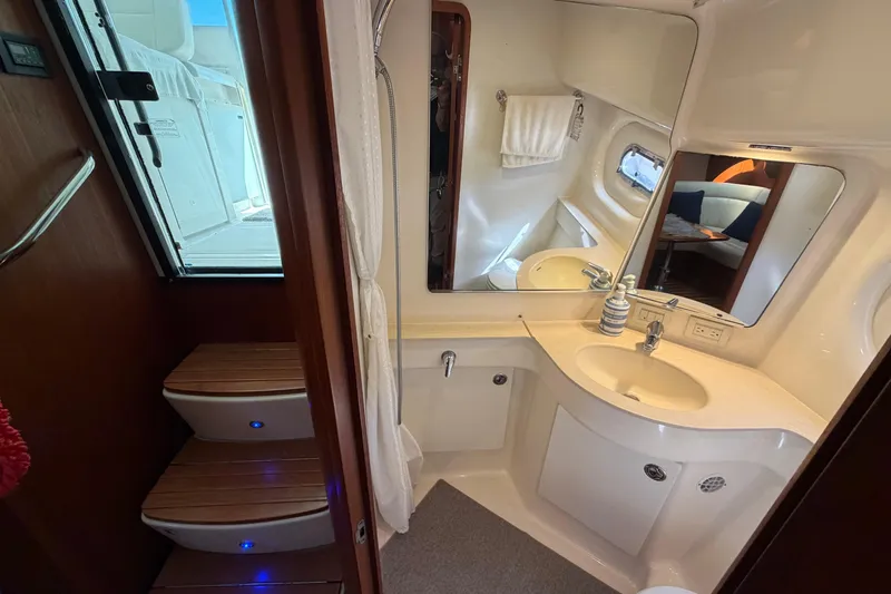 Slide: The Image of Luxurious bathroom interior of 2005 Tiara Yachts 3600 Sovran with modern amenities. - 32