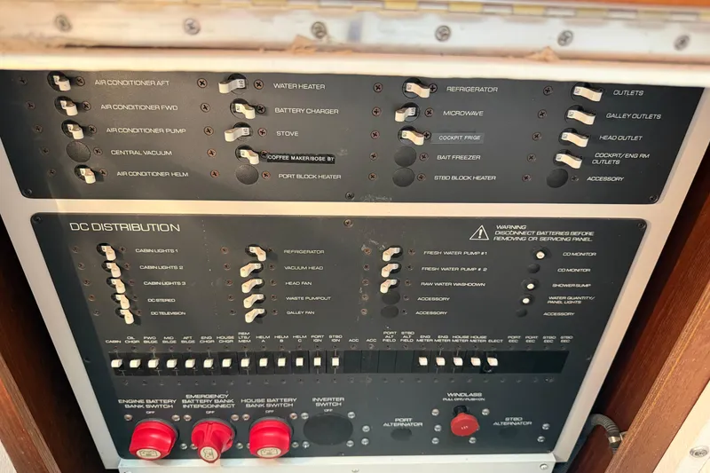 Slide: The Image of Electrical control panel of a 2005 Tiara Yachts 3600 Sovran, featuring various switches and indicators. - 36