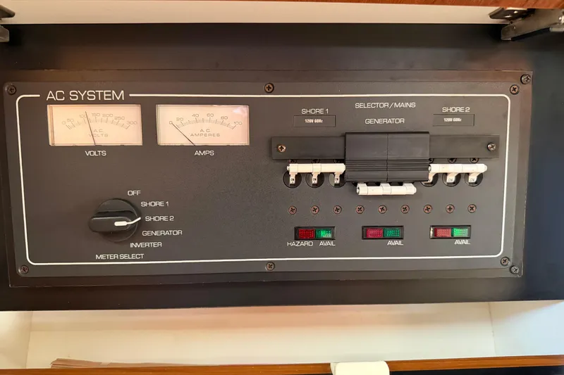Slide: The Image of AC system control panel on a 2005 Tiara Yachts 3600 Sovran boat. - 37