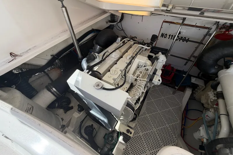 Slide: The Image of Engine room of a 2005 Tiara Yachts 3600 Sovran, showcasing mechanical components. - 40