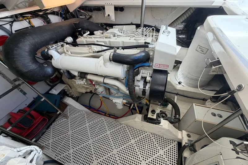 Slide: The Image of Engine room of a 2005 Tiara Yachts 3600 Sovran, showcasing mechanical components. - 41
