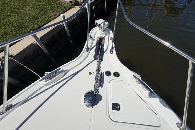 Slide: The Image of Bow view of 2005 Tiara Yachts 3600 Sovran, featuring anchor and railing. - 7