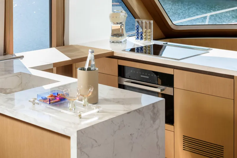 Slide: The Image of Luxurious kitchen interior of 2025 Vicem 65 Classic yacht with marble countertops. - 5