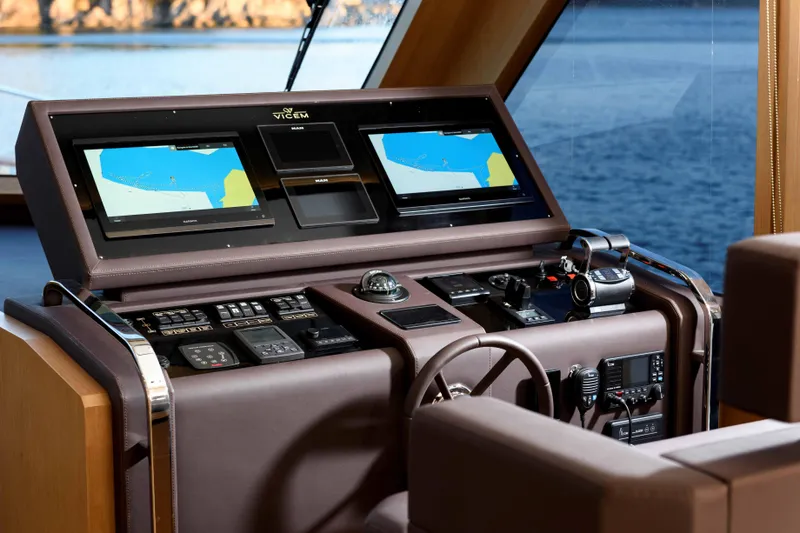 Slide: The Image of Cockpit of 2025 Vicem 65 Classic yacht with advanced navigation systems and controls. - 8