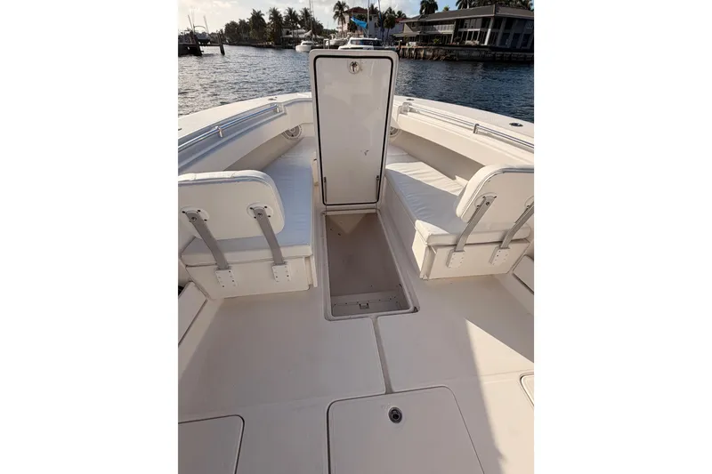 Slide: The Image of 2017 Invincible 39 Open Fisherman boat interior with seating and storage compartments. - 10