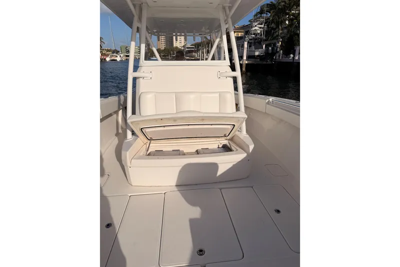 Slide: The Image of 2017 Invincible 39 Open Fisherman boat interior with open storage compartment. - 16