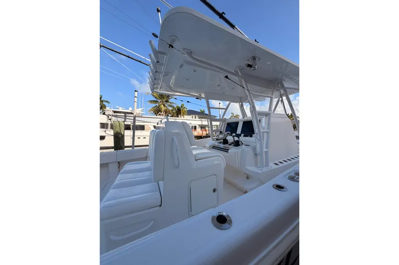 Slide: The Image of 2017 Invincible 39 Open Fisherman boat interior with seating and control panel. - 22