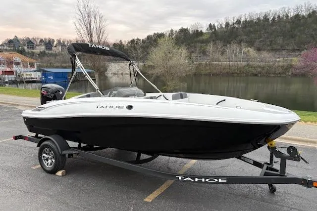 Slide: The Image of 2026 Tahoe T18 boat on trailer by a scenic lakeside. - 65