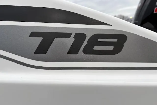 Slide: The Image of Close-up of 2026 Tahoe T18 model logo on a sleek white surface. - 80