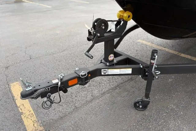 Slide: The Image of Trailer hitch of 2026 Tahoe T18 boat on asphalt parking lot. - 82