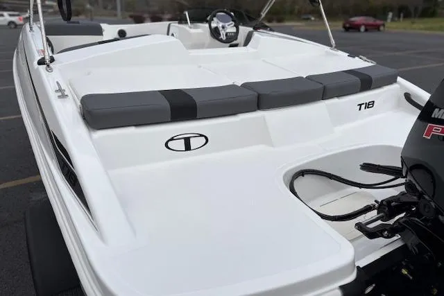 Slide: The Image of 2026 Tahoe T18 boat with sleek white design and comfortable seating. - 88