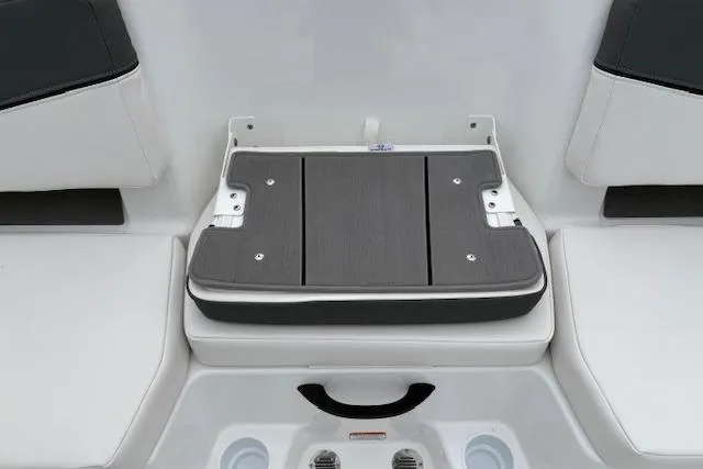 Slide: The Image of 2026 Tahoe T18 boat seating area with foldable seat and cup holders. - 92