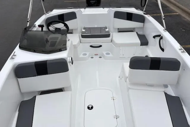 Slide: The Image of 2026 Tahoe T18 boat interior with sleek seating and modern dashboard design. - 94