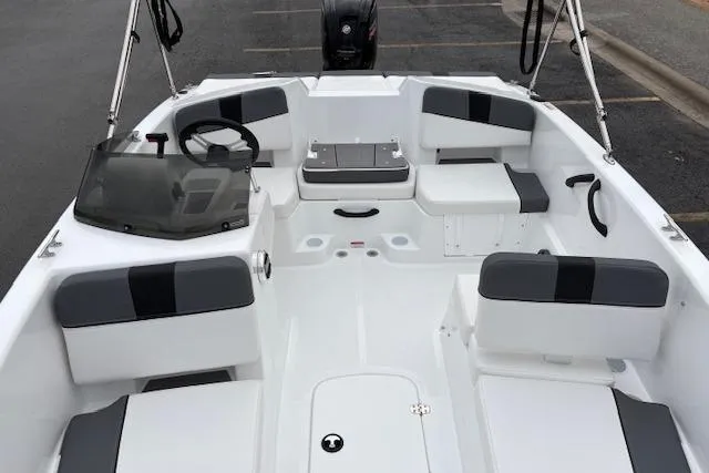 Slide: The Image of 2026 Tahoe T18 boat interior with seating and steering wheel. - 95