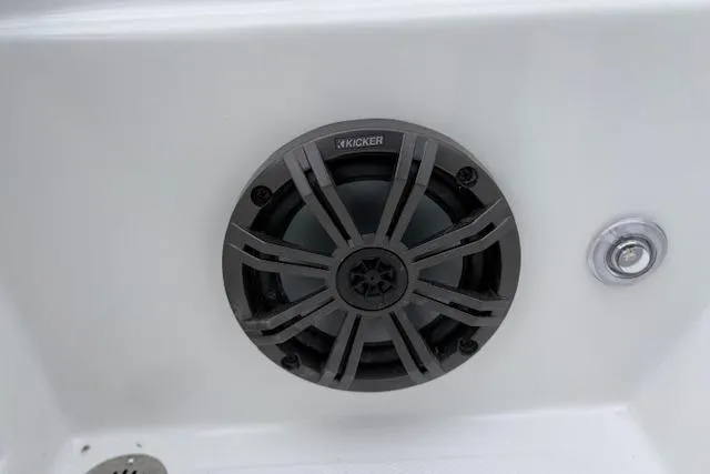 Slide: The Image of 2026 Tahoe T18 boat speaker system with Kicker audio on white surface. - 96