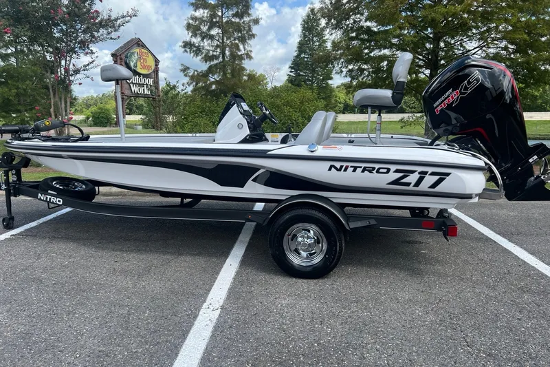 The Image of 2026 Nitro Z17 boat parked outdoors, featuring sleek design and powerful engine. - 0