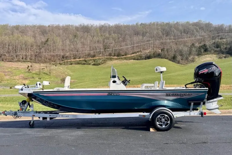 The Image of 2026 Ranger RB190 boat on trailer, scenic countryside background. - 0